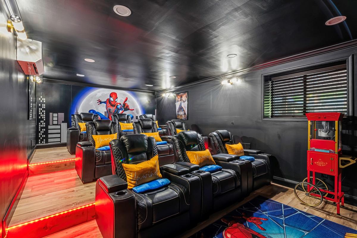 Home Theater: Enjoy movie magic in plush recliners with popcorn and superhero vibes!